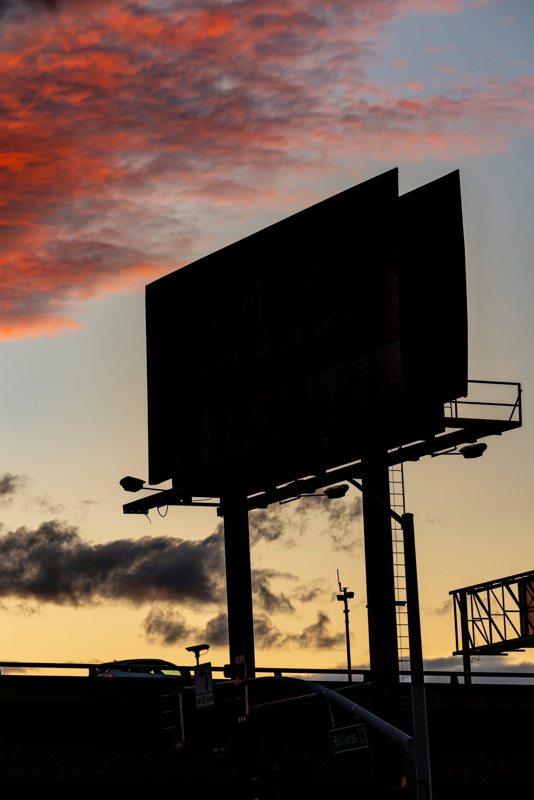 Outdoor media facade and billboard at dusk